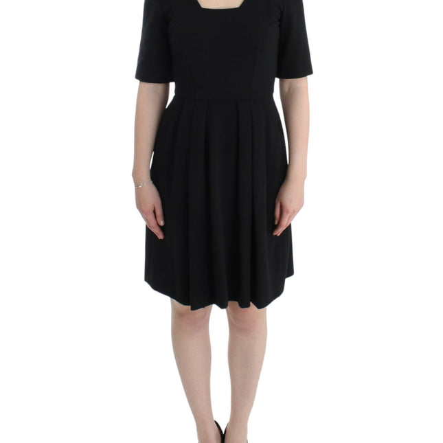 CO|TE Black short sleeve venus dress