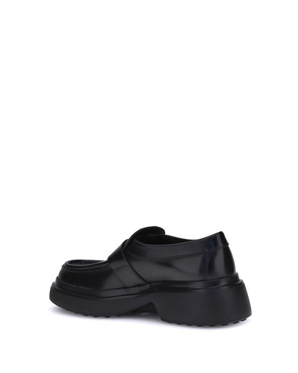 Tod's Black Rubber Platform Loafers