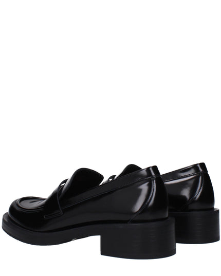 Stuart Weitzman Black Leather Slip-On Loafers