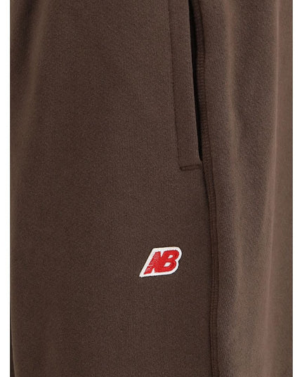 New Balance Elastic-waistband logo-patch track Pants